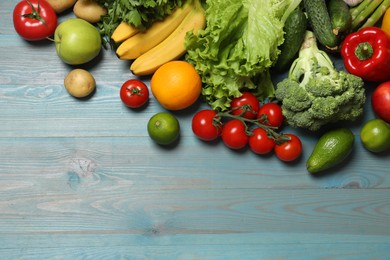 Photo of Source of protein for vegetarians. Different fresh vegetables, fruits and cereals on light blue wooden table, top view. Space for text