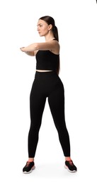 Young woman doing aerobic exercise on white background