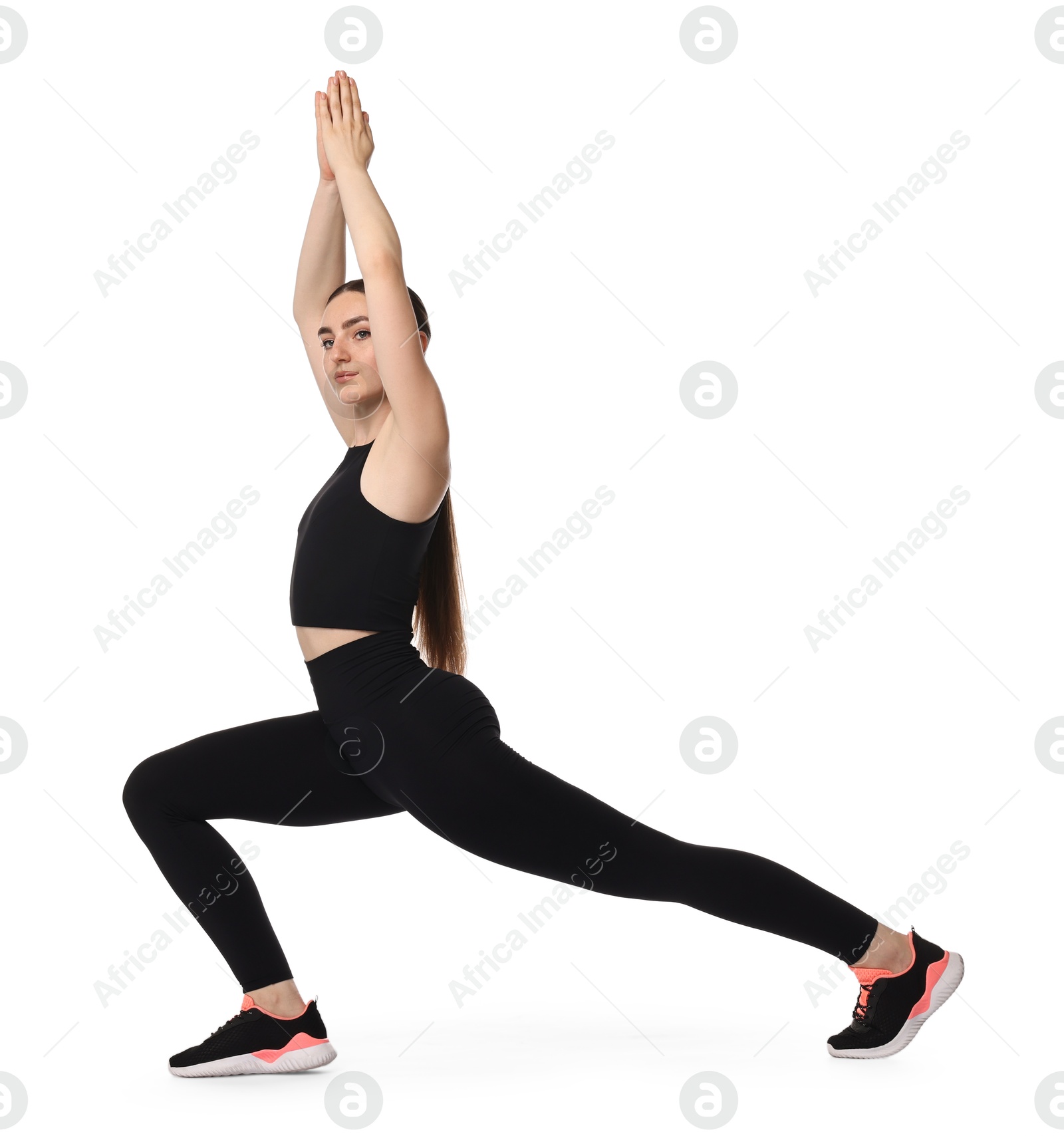 Photo of Aerobics. Young woman doing stretching exercise on white background