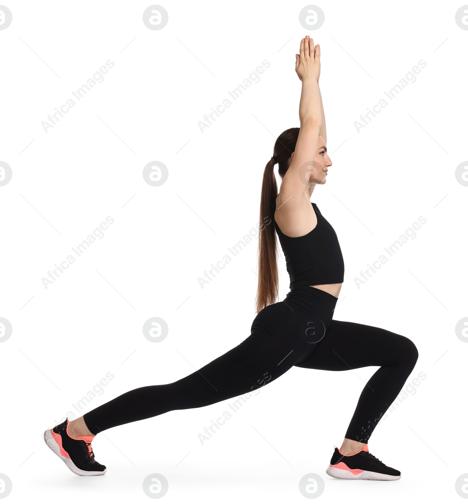 Photo of Aerobics. Young woman doing stretching exercise on white background