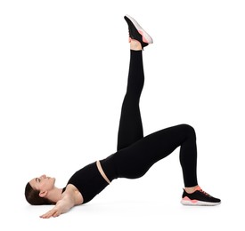 Young woman doing aerobic exercise on white background