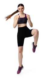 Young woman doing aerobic exercise on white background