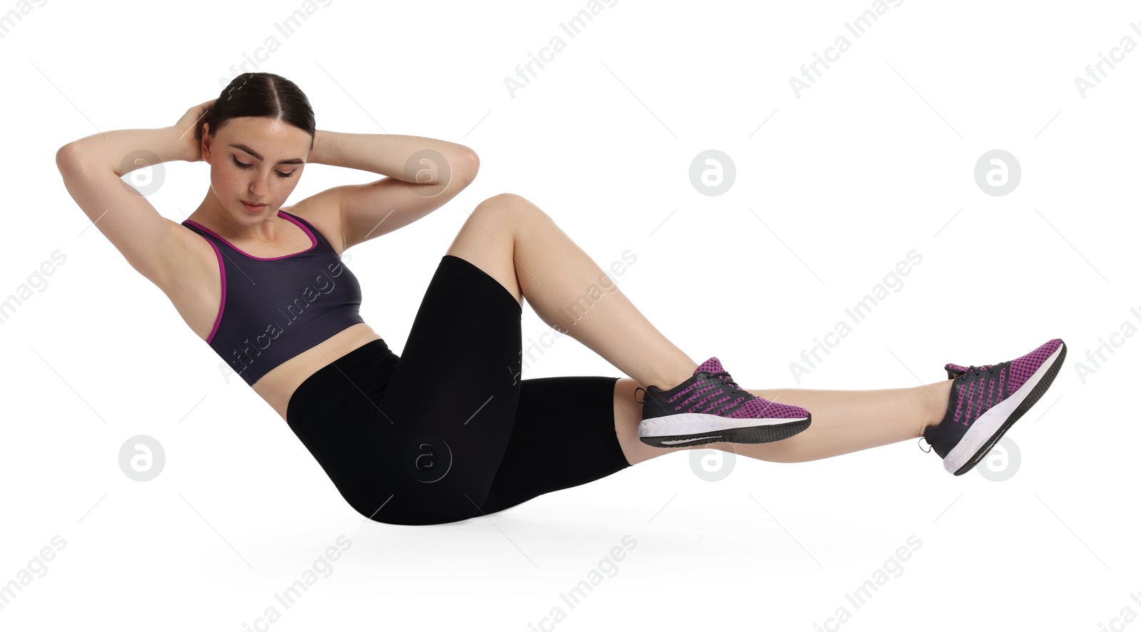 Photo of Young woman doing aerobic exercise on white background