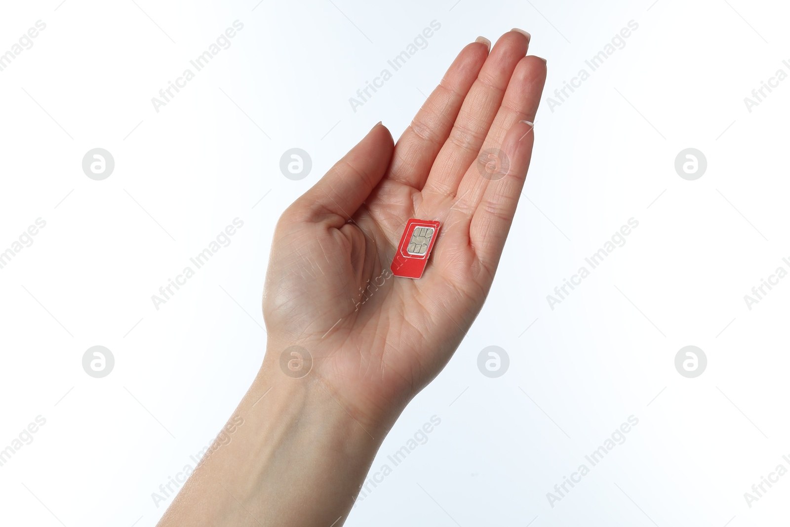 Photo of Woman with SIM card on white background, closeup