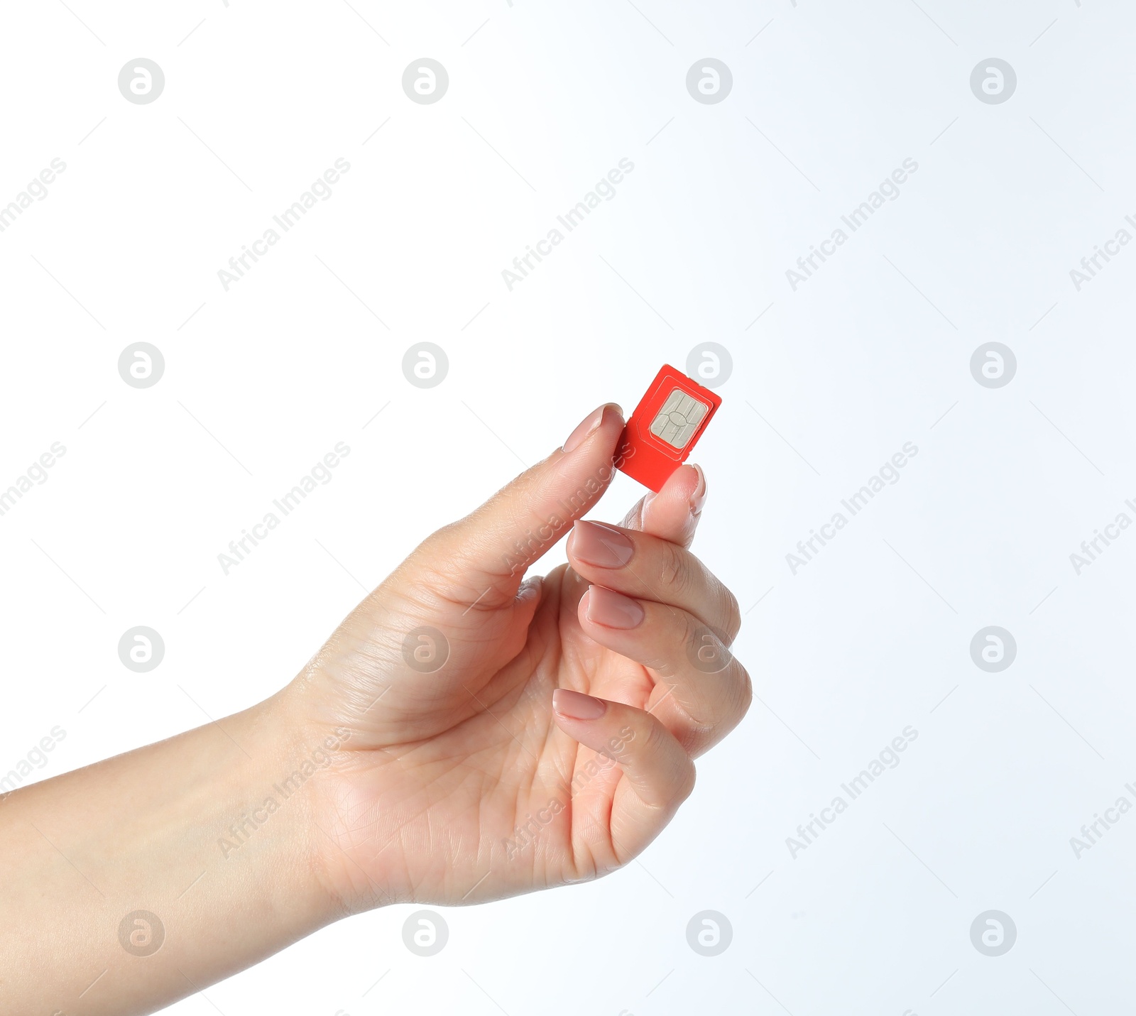 Photo of Woman with SIM card on white background, closeup