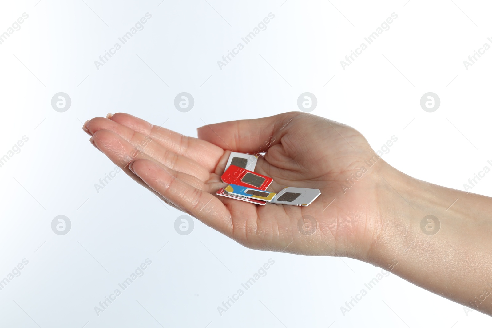 Photo of Woman with SIM cards on white background, closeup