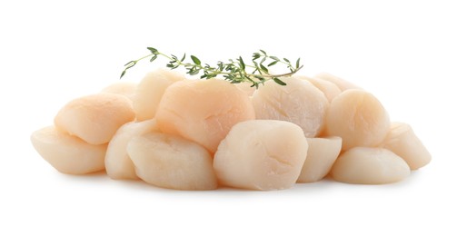 Photo of Pile of fresh raw scallops and thyme isolated on white