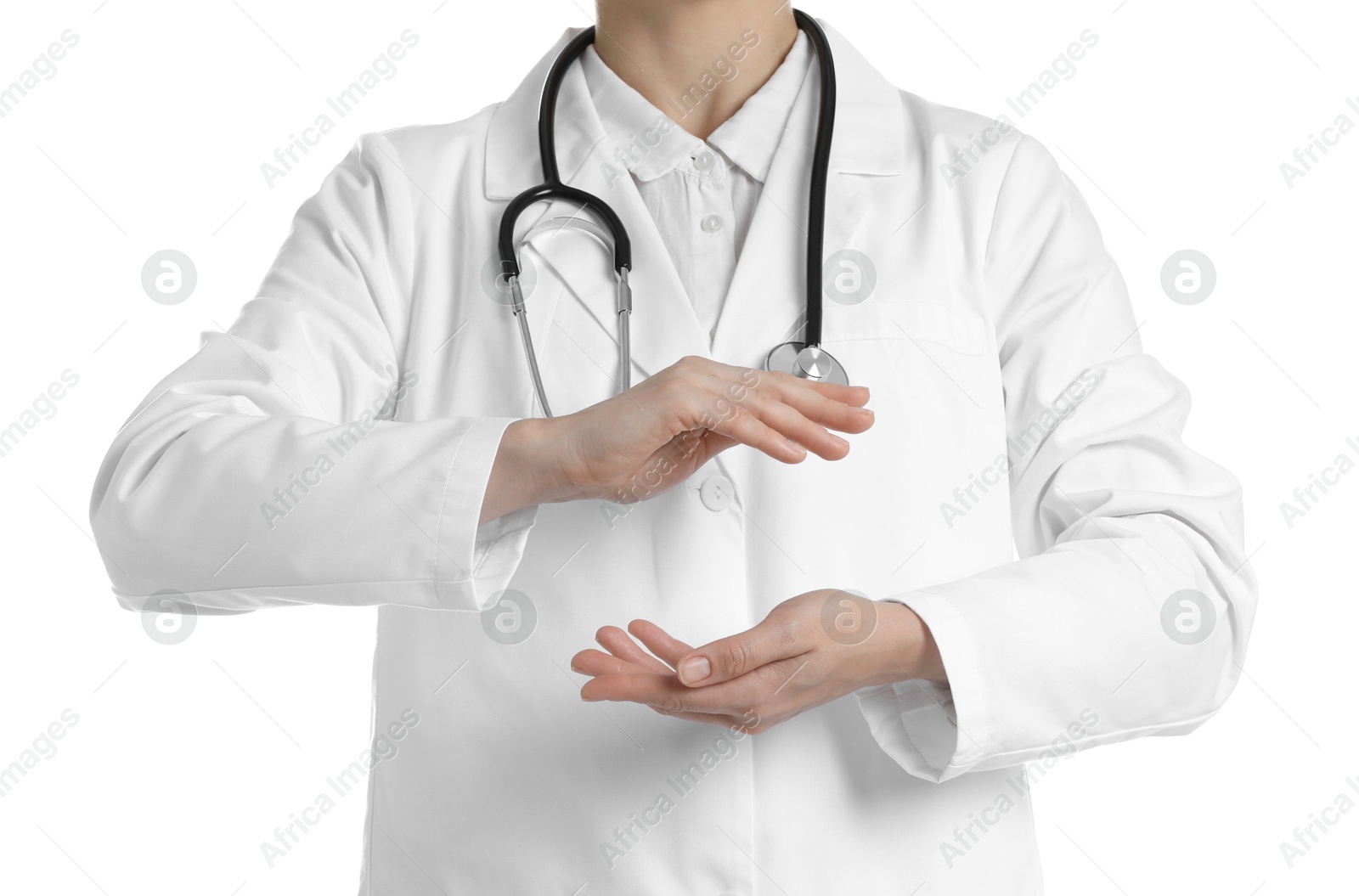 Photo of Doctor holding something on white background, closeup