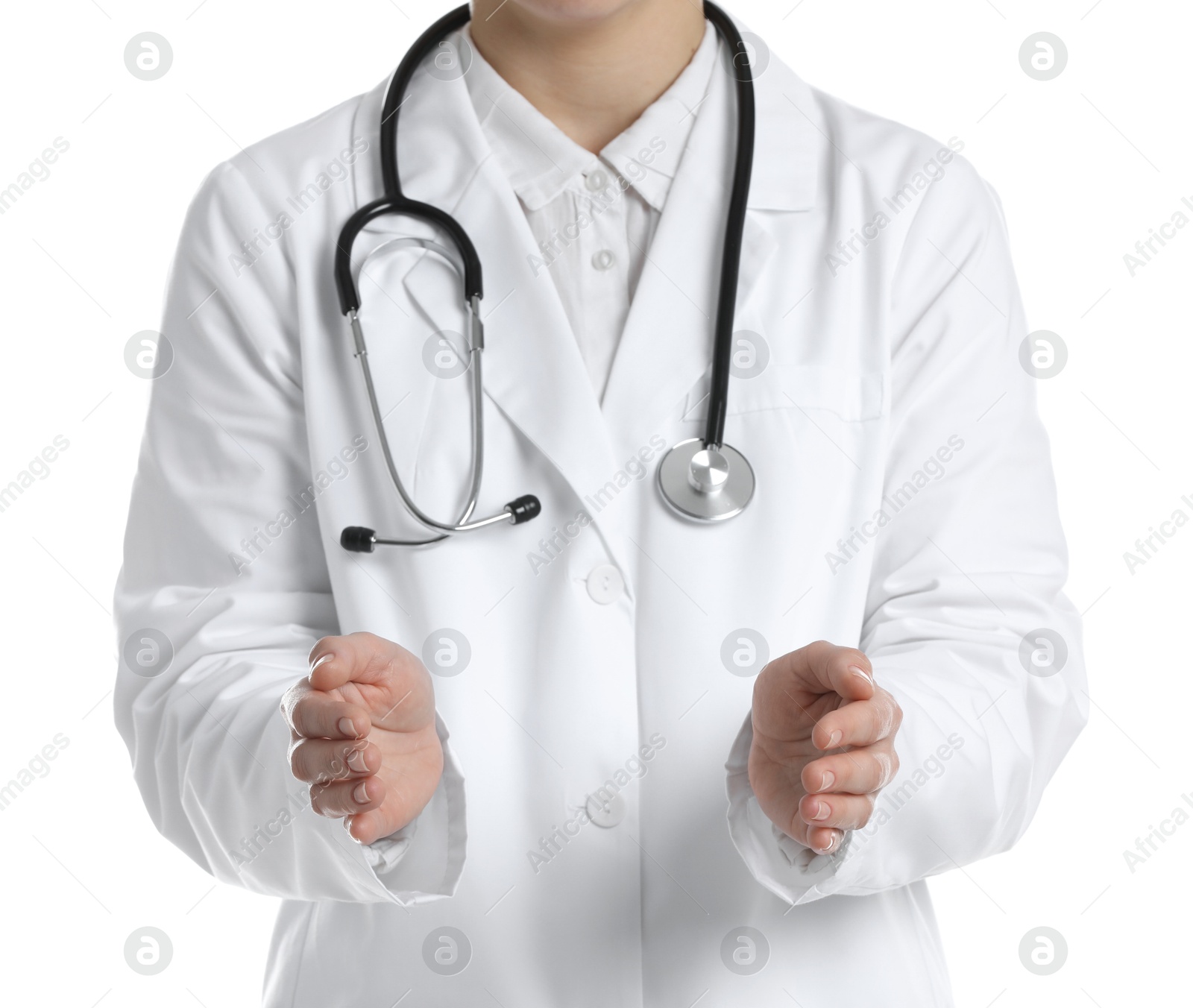 Photo of Doctor holding something on white background, closeup