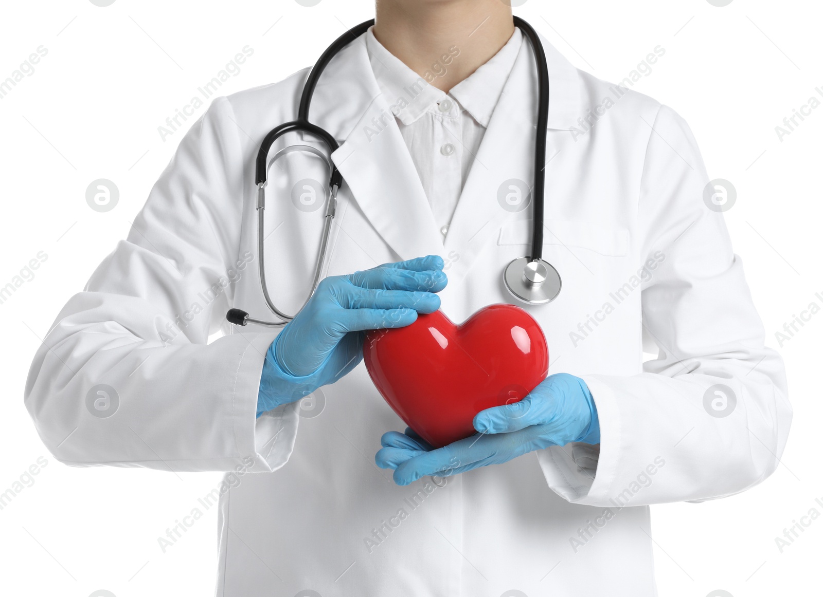 Photo of Doctor with red heart on white background, closeup