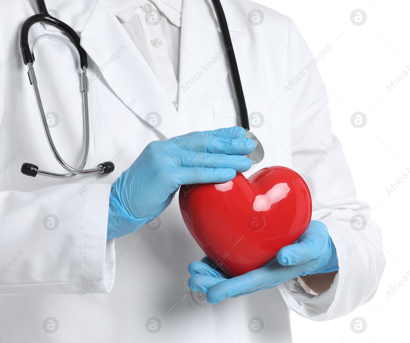 Photo of Doctor with red heart on white background, closeup