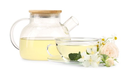 Photo of Aromatic herbal tea with different flowers and mint isolated on white
