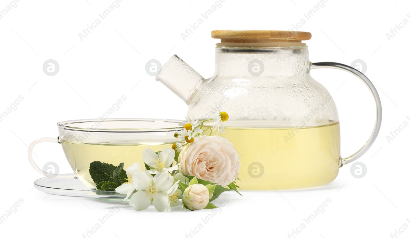 Photo of Aromatic herbal tea with different flowers and mint isolated on white