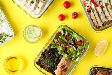 Healthy diet. Different meals in glass containers and ingredients on yellow background, flat lay