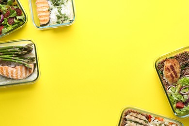 Photo of Healthy food. Different meals in glass containers on yellow background, flat lay. Space for text