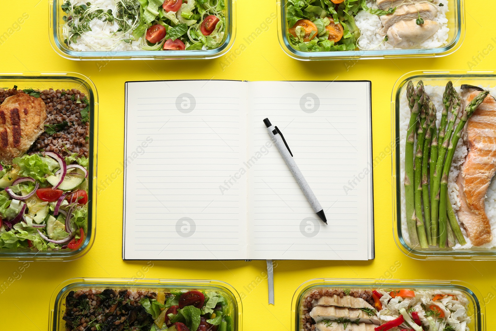 Photo of Healthy food. Different meals in glass containers, open notebook and pen on yellow background, flat lay