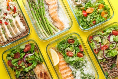 Healthy food. Different meals in glass containers on yellow background, flat lay