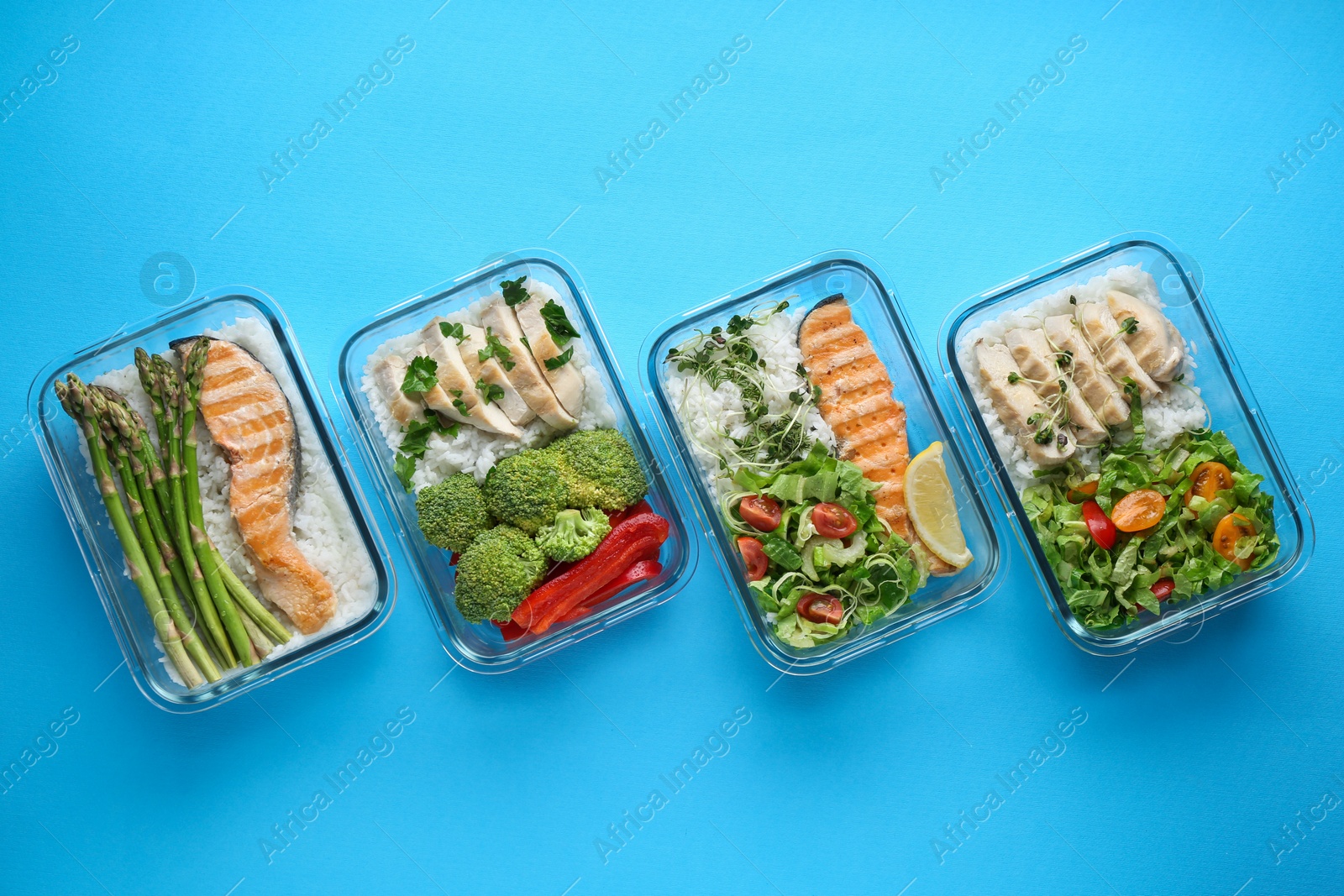 Photo of Healthy food. Different meals in glass containers on light blue background, flat lay