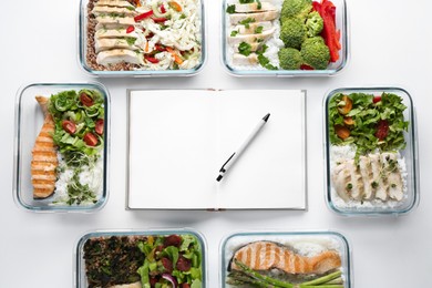 Photo of Healthy food. Open notebook, pen and different meals on white background, flat lay