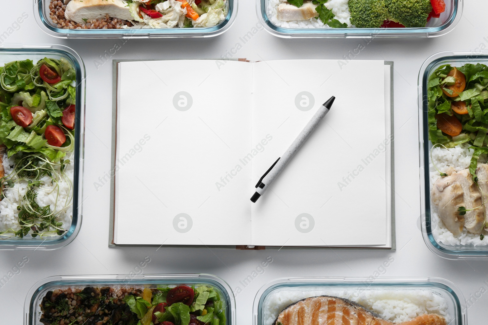 Photo of Healthy food. Open notebook, pen and different meals on white background, flat lay