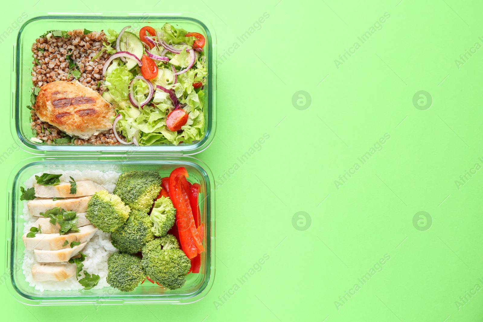 Photo of Healthy food. Different meals in glass containers on green background, top view. Space for text