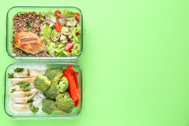 Photo of Healthy food. Different meals in glass containers on green background, top view. Space for text