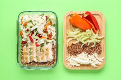 Photo of Healthy meal. Different fresh products on green background, top view