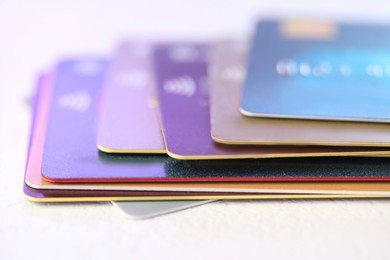 Photo of Plastic credit cards on table, closeup view