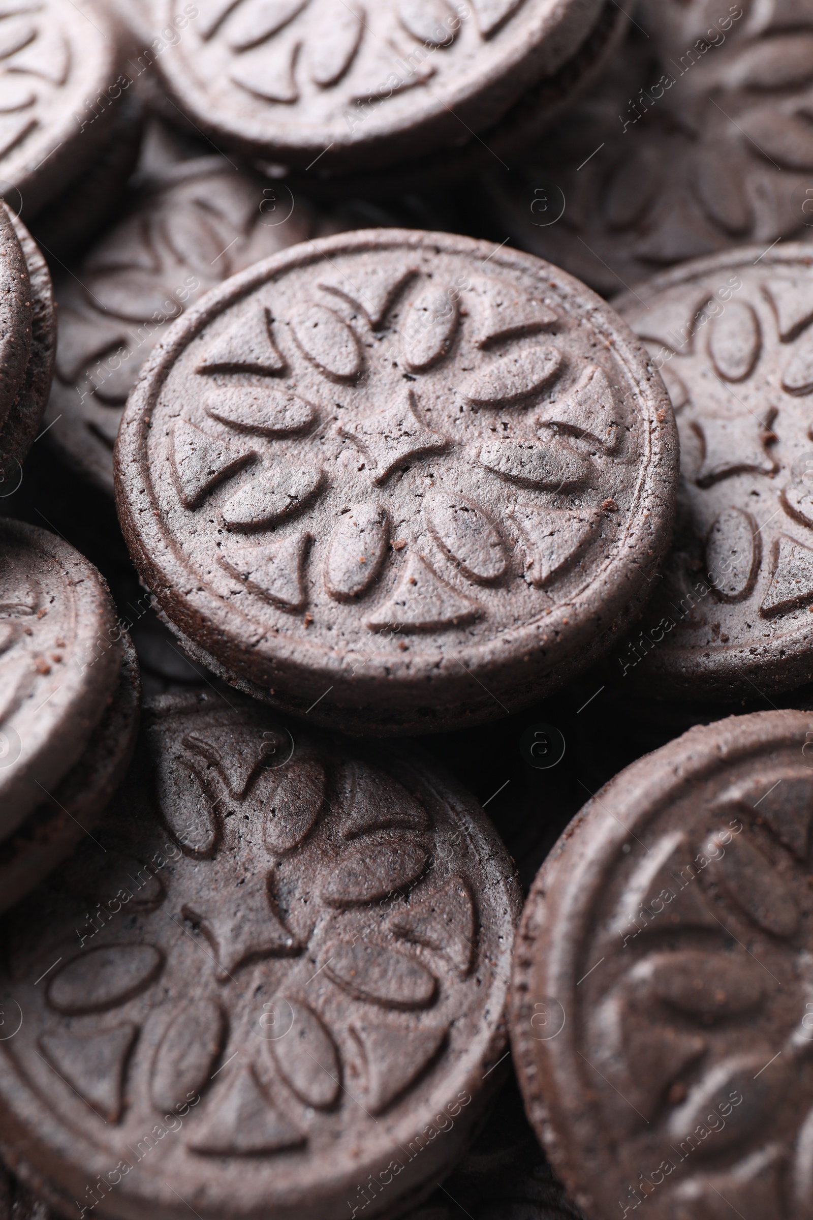 Photo of Tasty sandwich cookies as background, closeup view