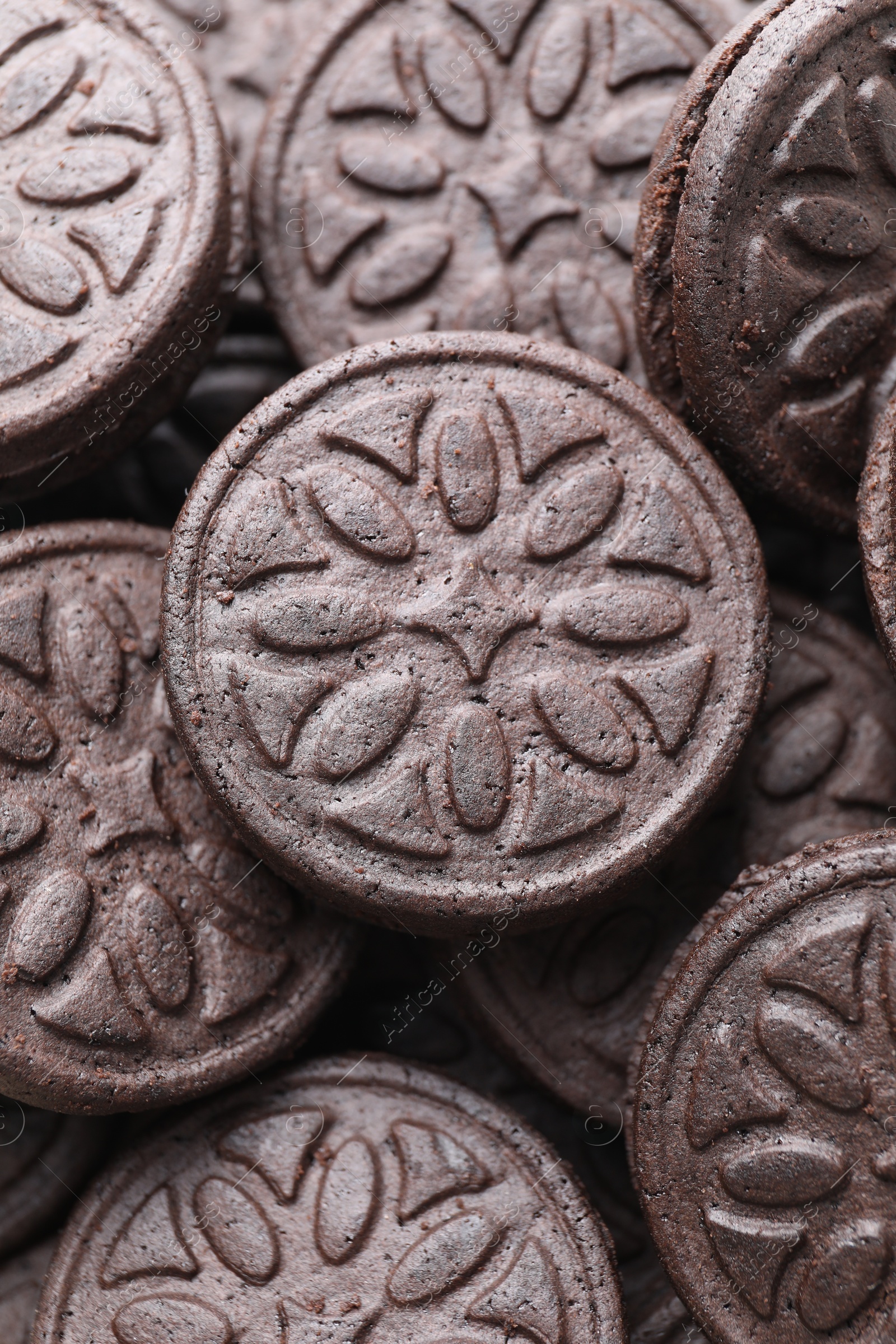 Photo of Tasty sandwich cookies as background, top view