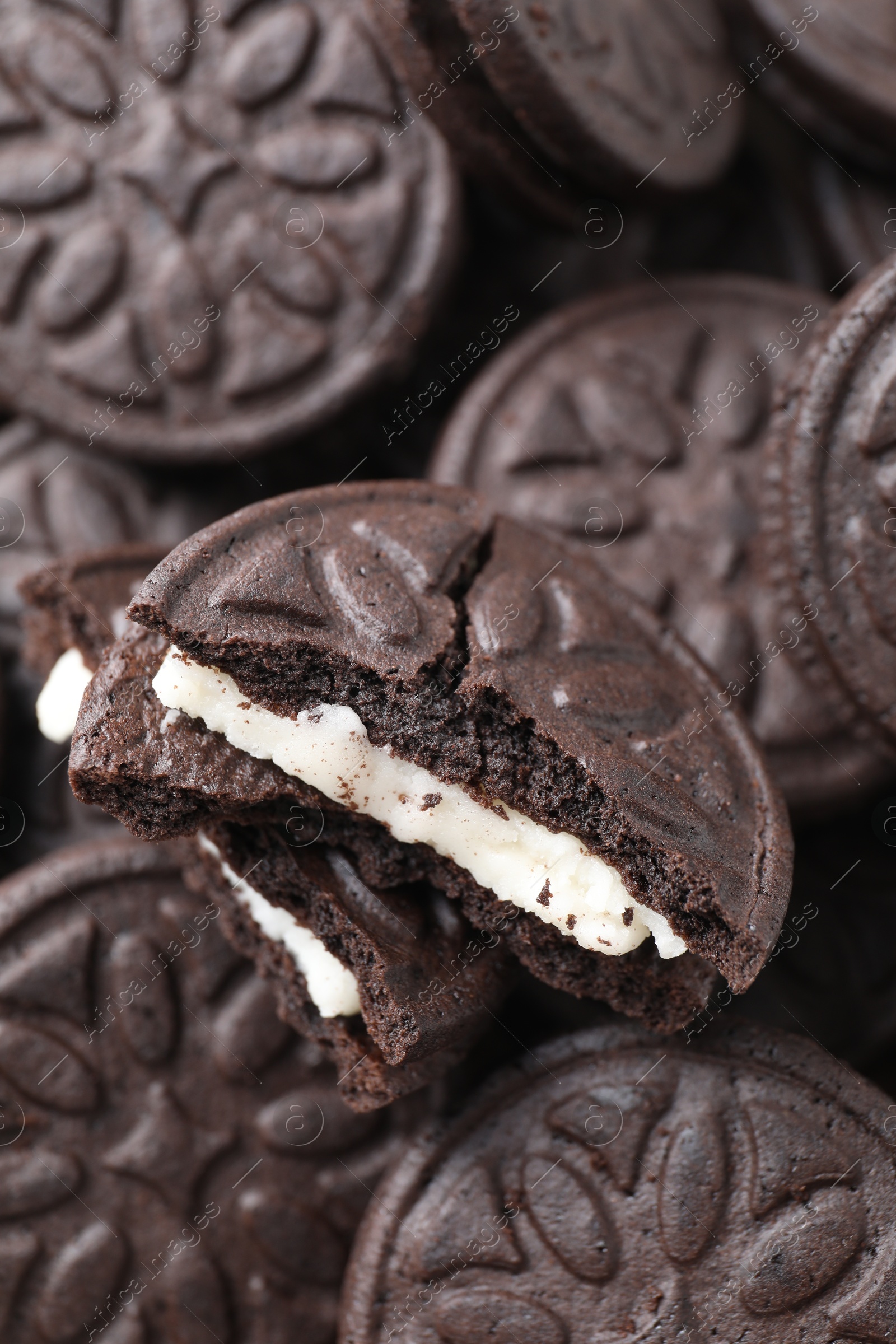 Photo of Tasty sandwich cookies as background, closeup view