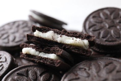 Photo of Tasty sandwich cookies on white background, closeup