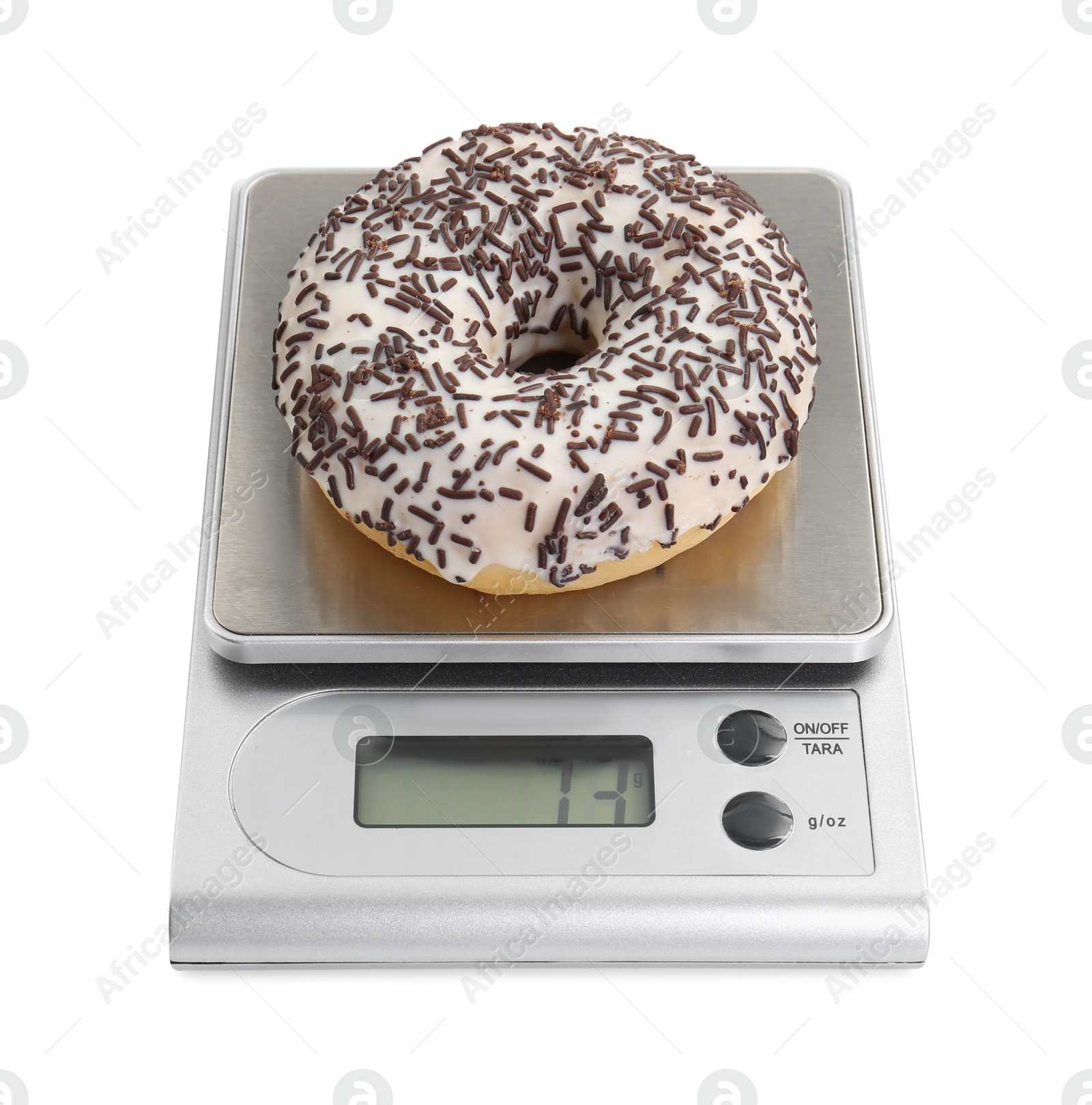 Photo of Kitchen scale with donut isolated on white