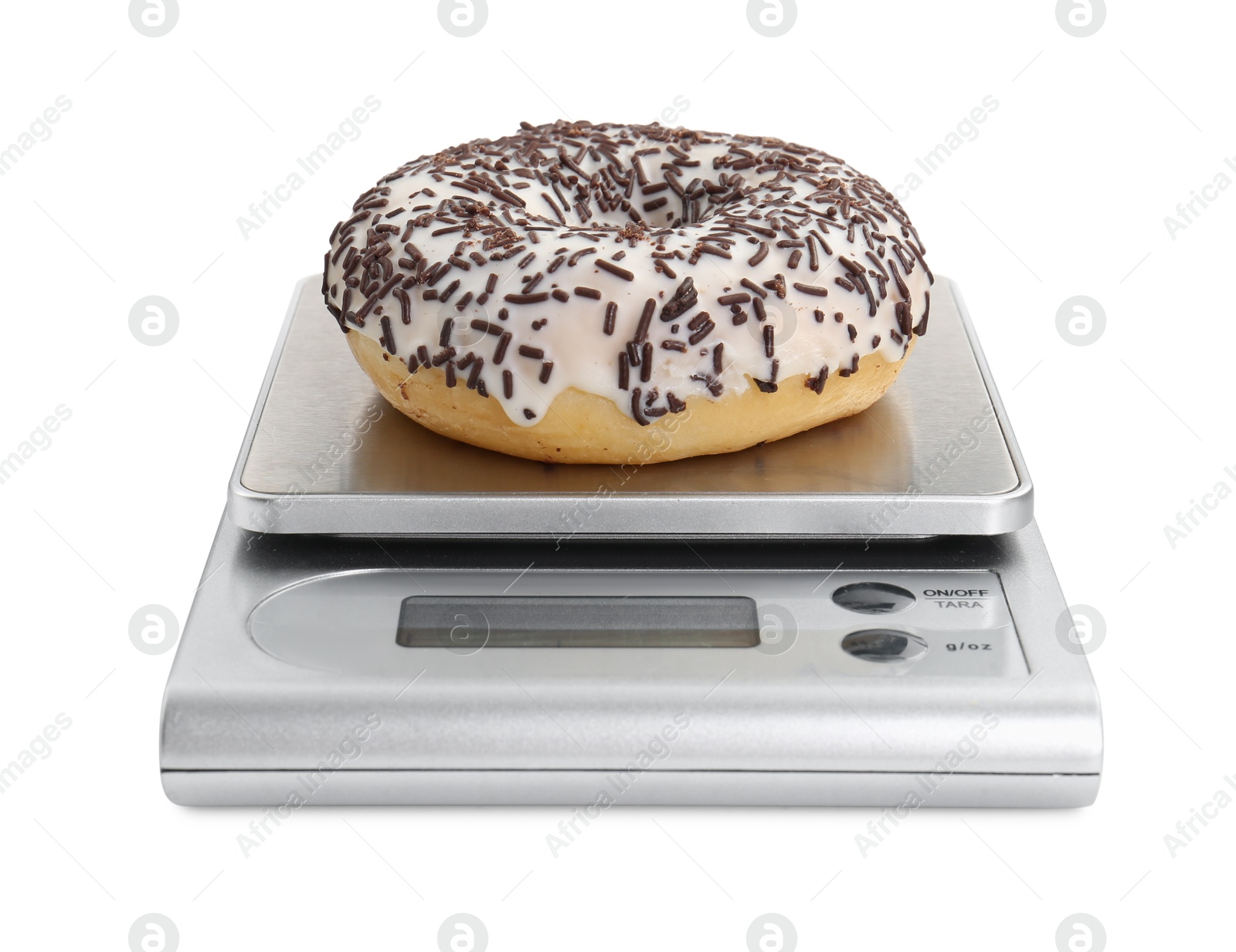 Photo of Kitchen scale with donut isolated on white