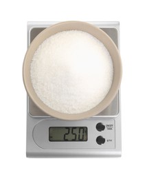 Photo of Kitchen scale with bowl of sugar isolated on white, top view