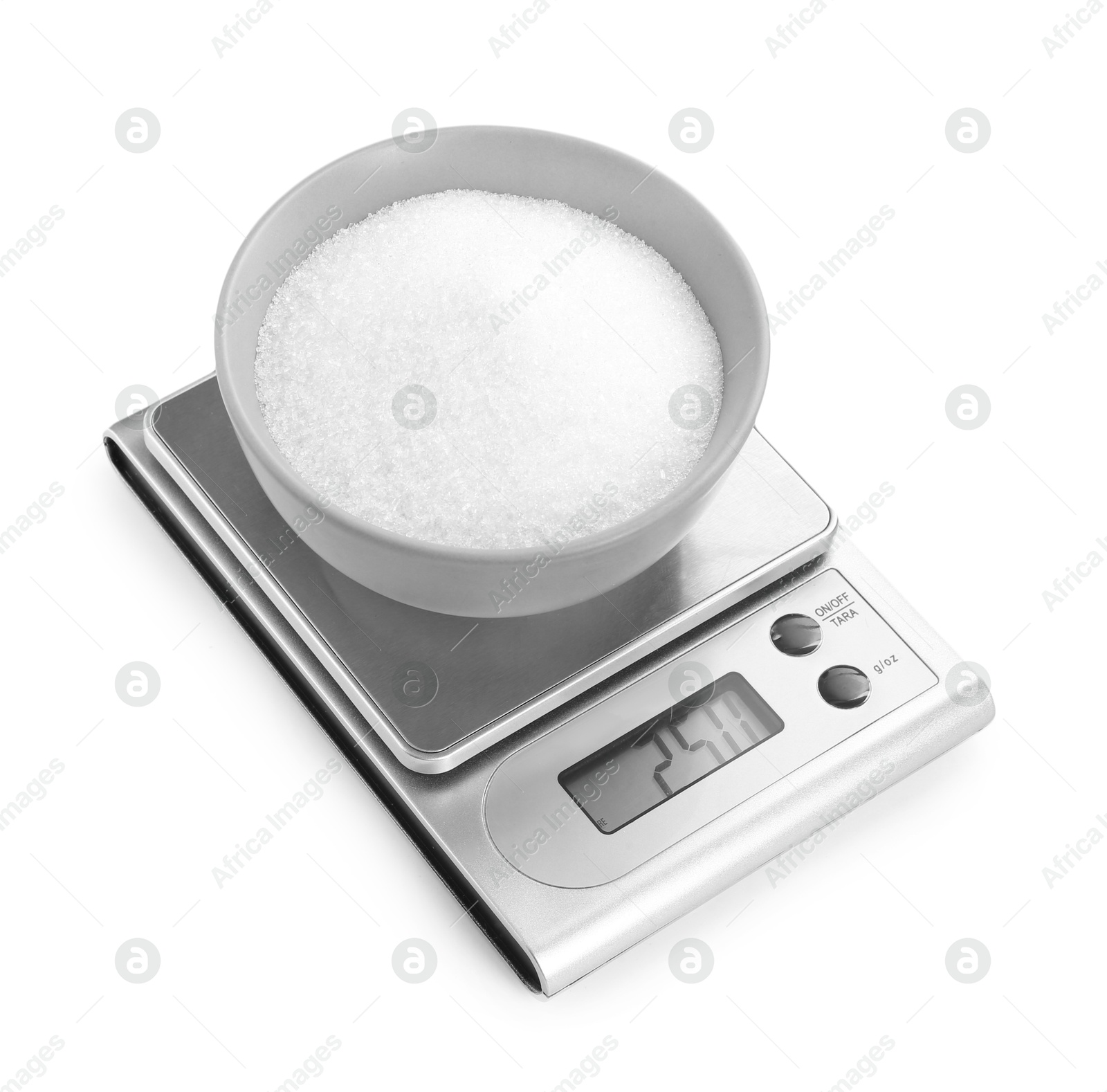 Photo of Kitchen scale with bowl of sugar isolated on white