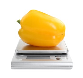 Kitchen scale with bell pepper isolated on white