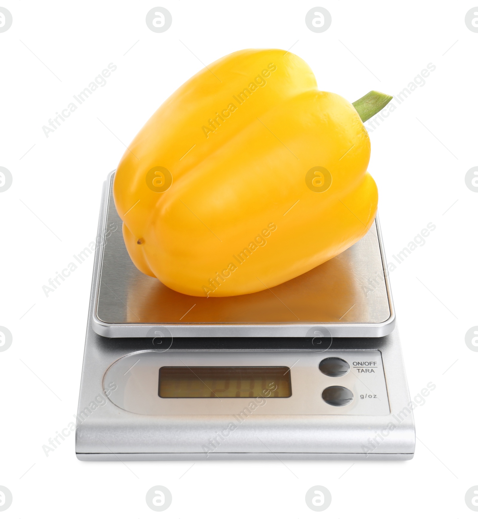 Photo of Kitchen scale with bell pepper isolated on white