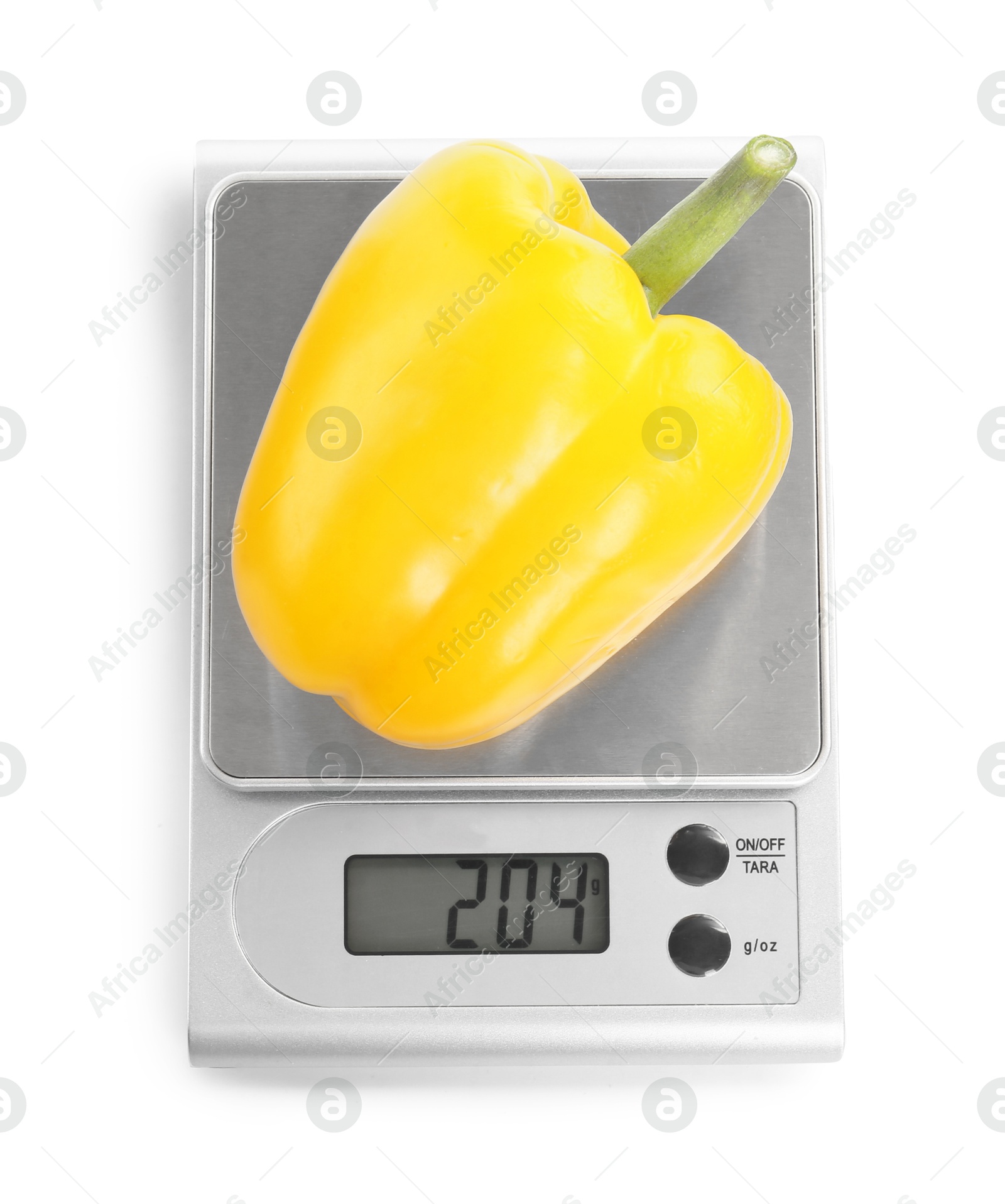 Photo of Kitchen scale with bell pepper isolated on white, top view