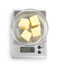 Kitchen scale with bowl of butter isolated on white, top view