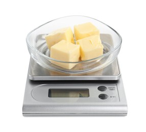 Kitchen scale with bowl of butter isolated on white