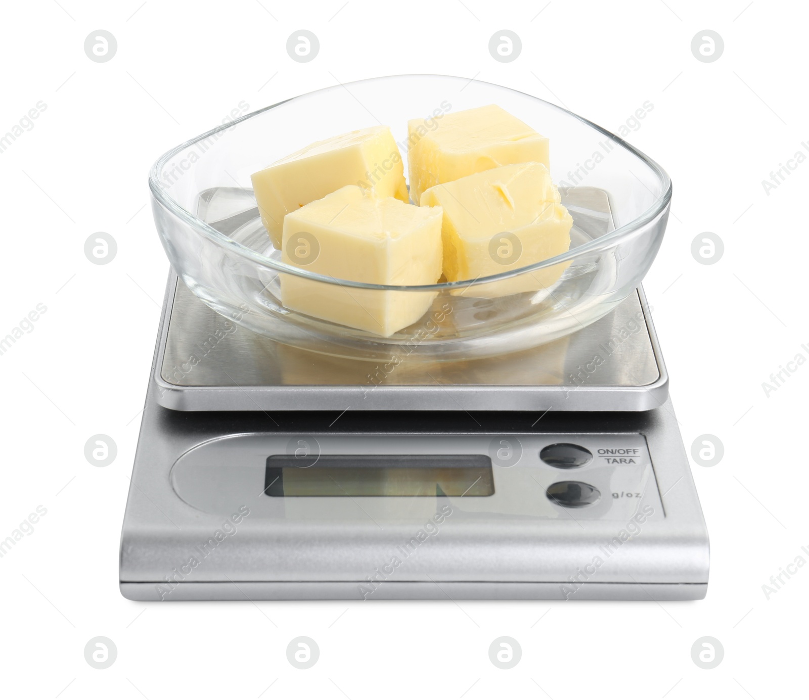 Photo of Kitchen scale with bowl of butter isolated on white