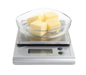 Photo of Kitchen scale with bowl of butter isolated on white