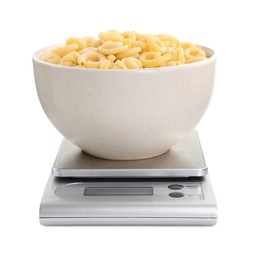 Kitchen scale with bowl of pasta isolated on white