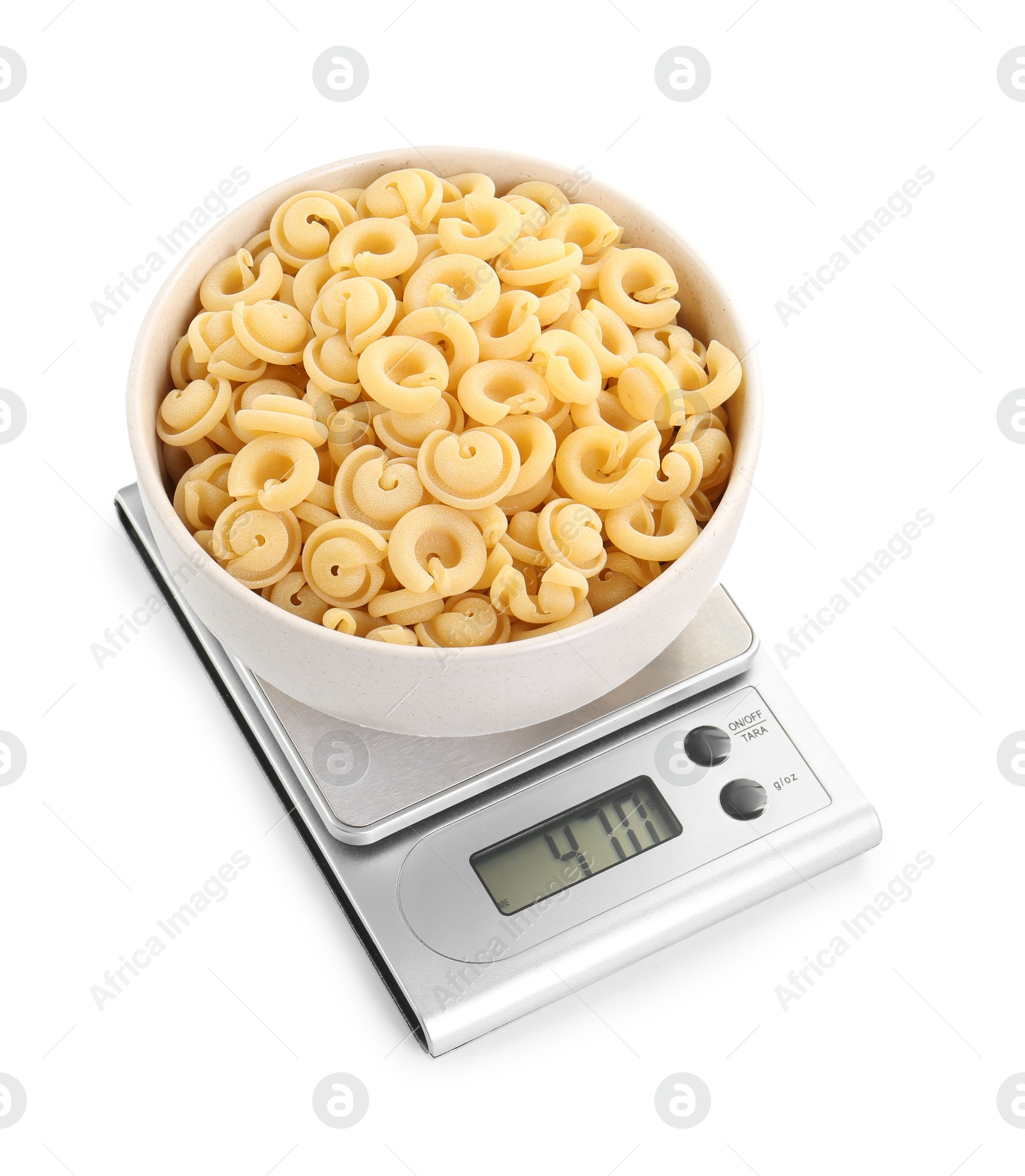 Photo of Kitchen scale with bowl of pasta isolated on white