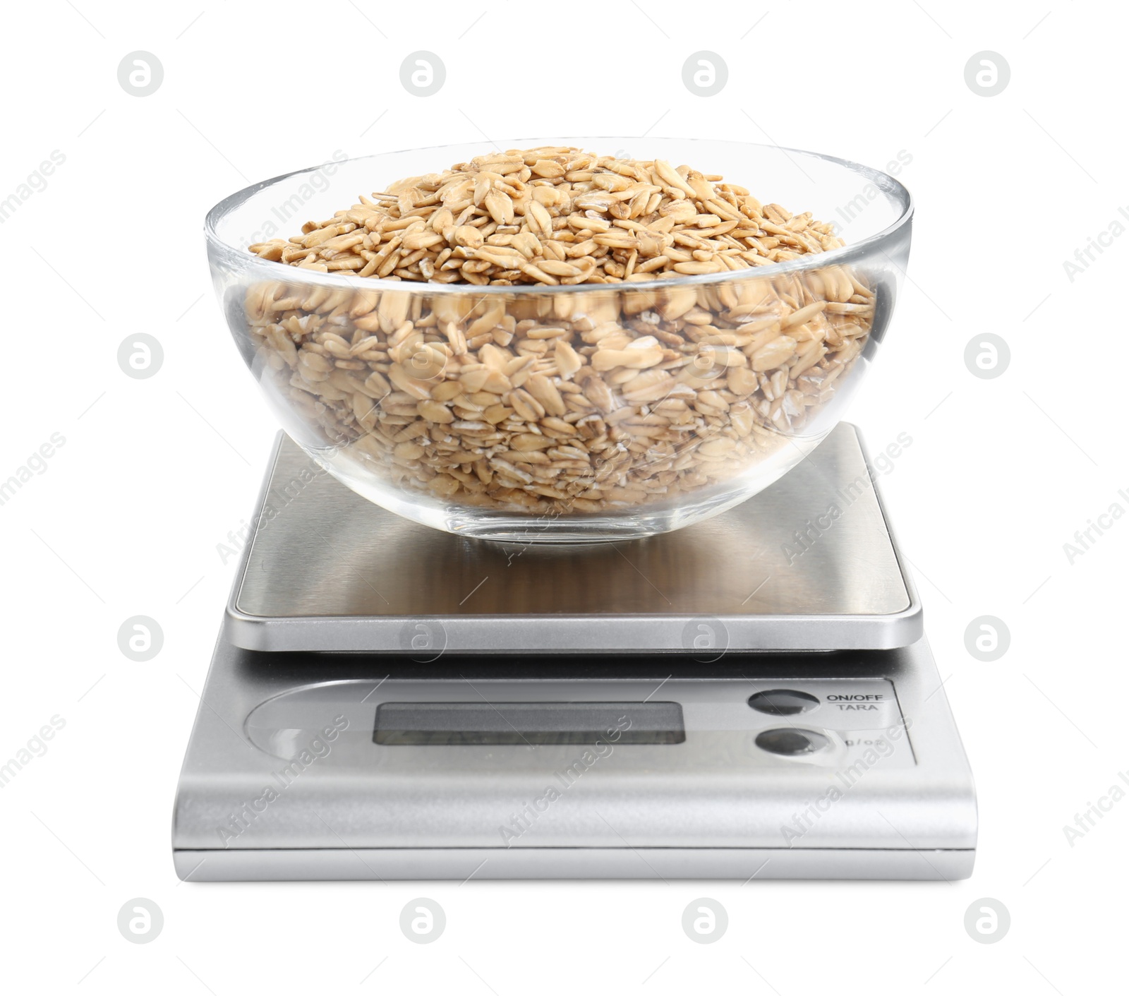 Photo of Kitchen scale with bowl of oats isolated on white