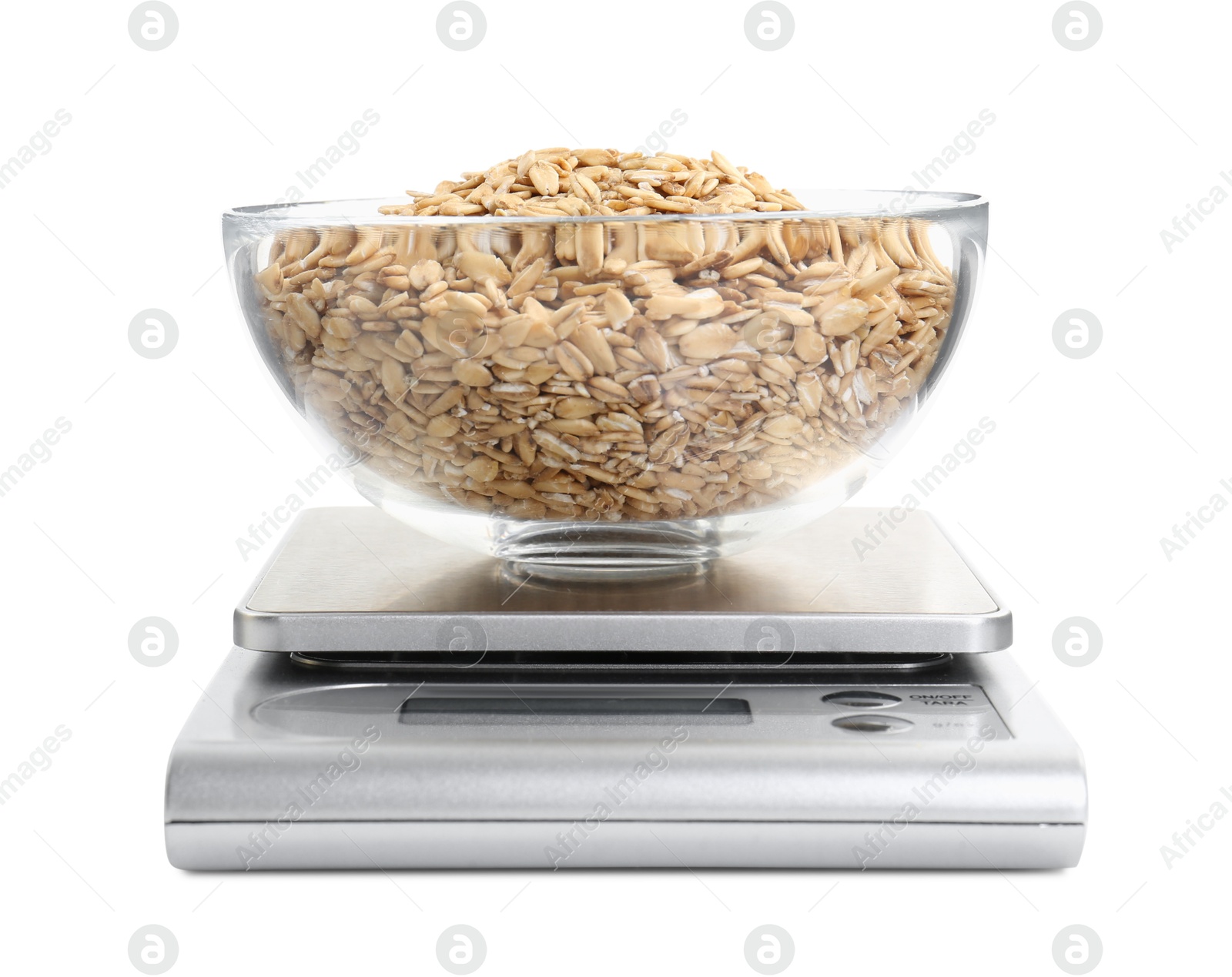 Photo of Kitchen scale with bowl of oats isolated on white