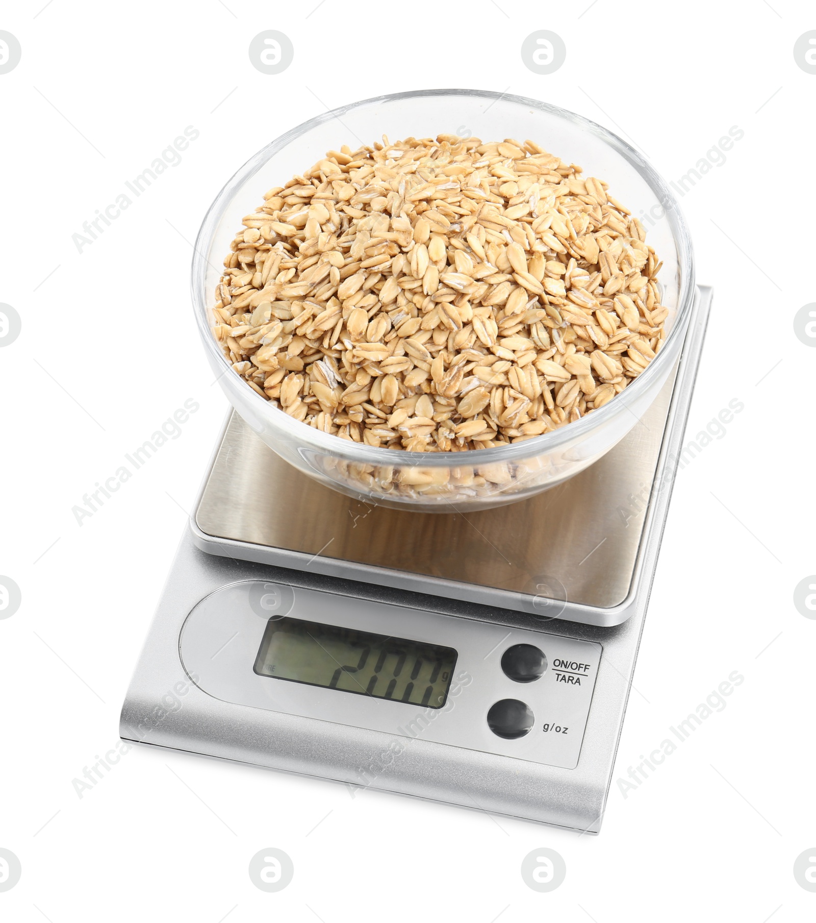 Photo of Kitchen scale with bowl of oats isolated on white