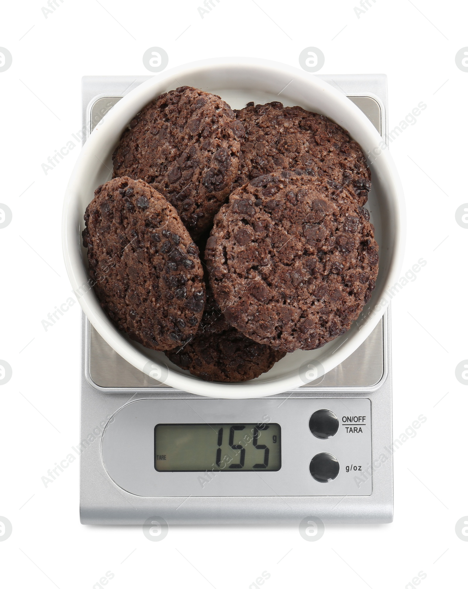 Photo of Kitchen scale with bowl of chocolate cookies isolated on white, top view