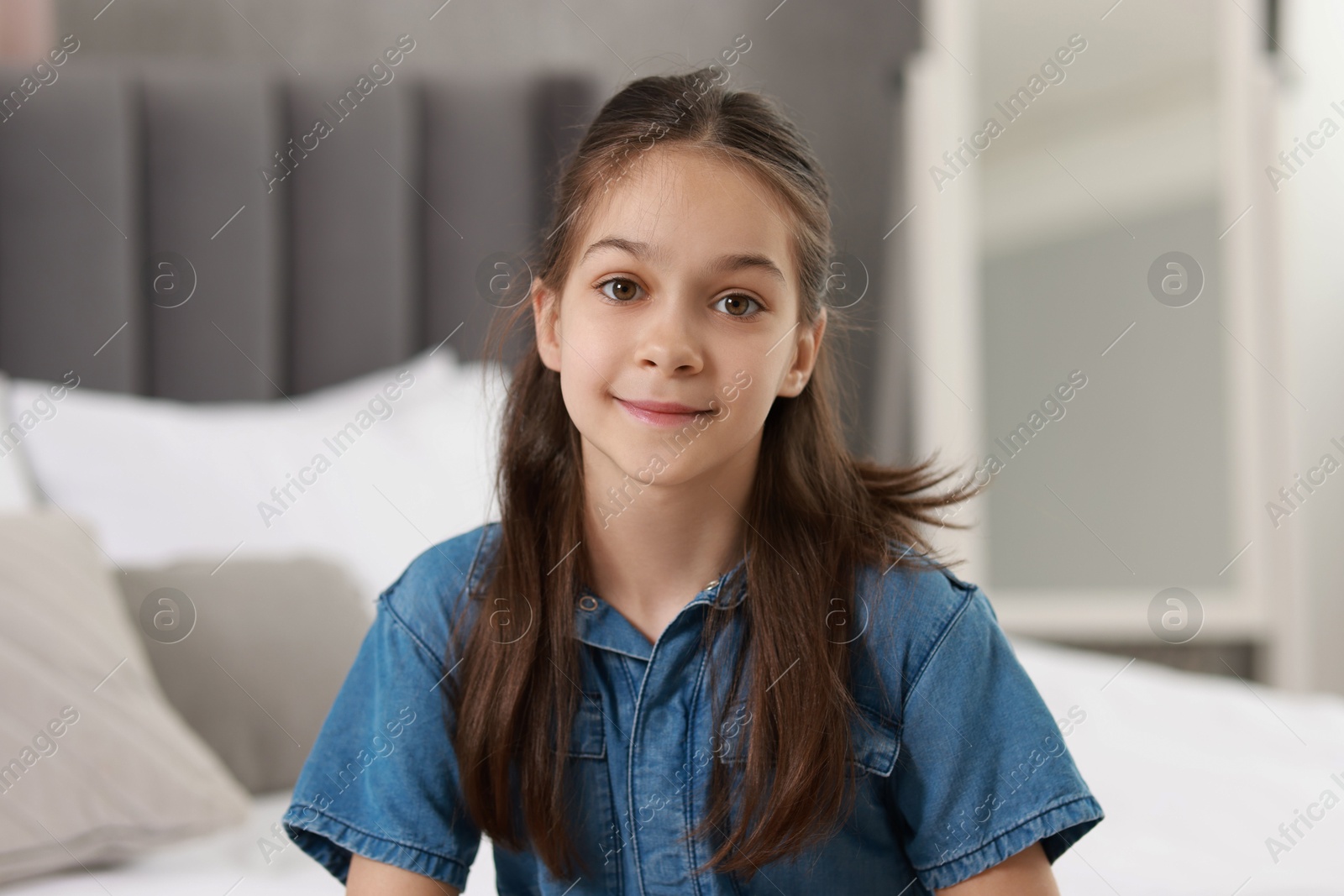 Photo of Portrait of beautiful little girl indoors. Cute child